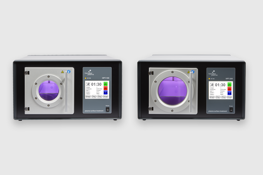 Henniker Plasma HPT-100 and HPT-200 benchtop vacuum plasma surface treatment systems with touchscreen control panels